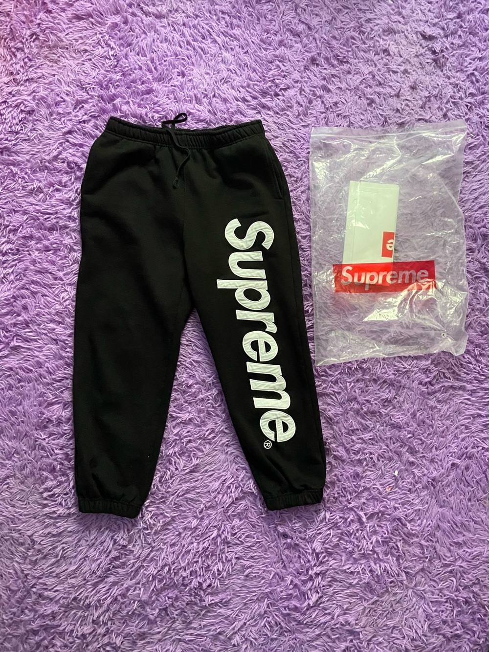 Supreme Kids Black Sweatpants with White Vertical Logo